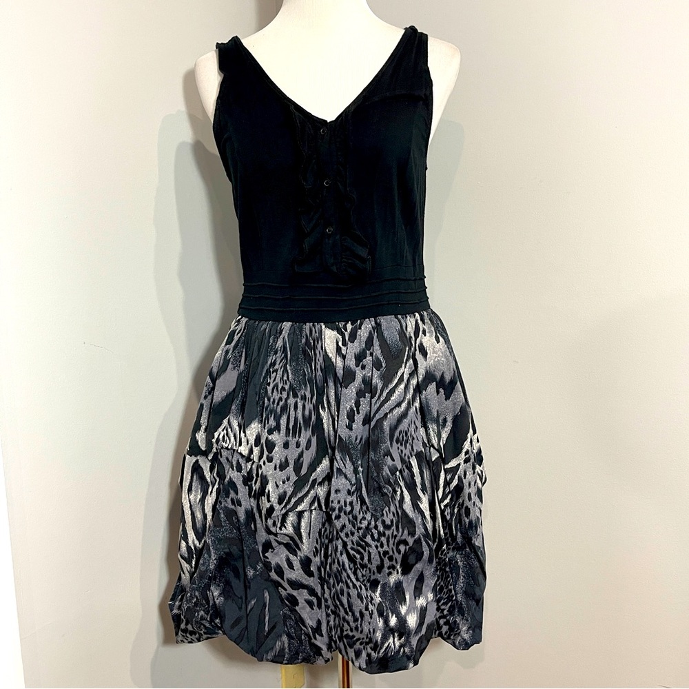 Black top and gray animal print bottom dress